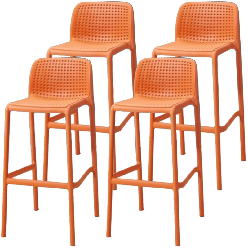 Modern Armless Backrest Counter Stool Plastic Bar Stool with Plastic Seat and Pedal Orange 4 Piece Set Clearhalo 'Bar Furniture' 'Bar Stools' 'bar_stools' 'furn' 'furn_bar_stools' 'furniture_bar_stools' 'Kitchen & Dining Furniture' 'kitchen&dining_furn' 'kitchen' 'kitchen_furn' Furniture' 4555879