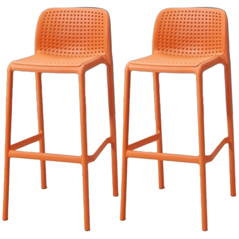 Modern Armless Backrest Counter Stool Plastic Bar Stool with Plastic Seat and Pedal Orange 2 Piece Set Clearhalo 'Bar Furniture' 'Bar Stools' 'bar_stools' 'furn' 'furn_bar_stools' 'furniture_bar_stools' 'Kitchen & Dining Furniture' 'kitchen&dining_furn' 'kitchen' 'kitchen_furn' Furniture' 4555881