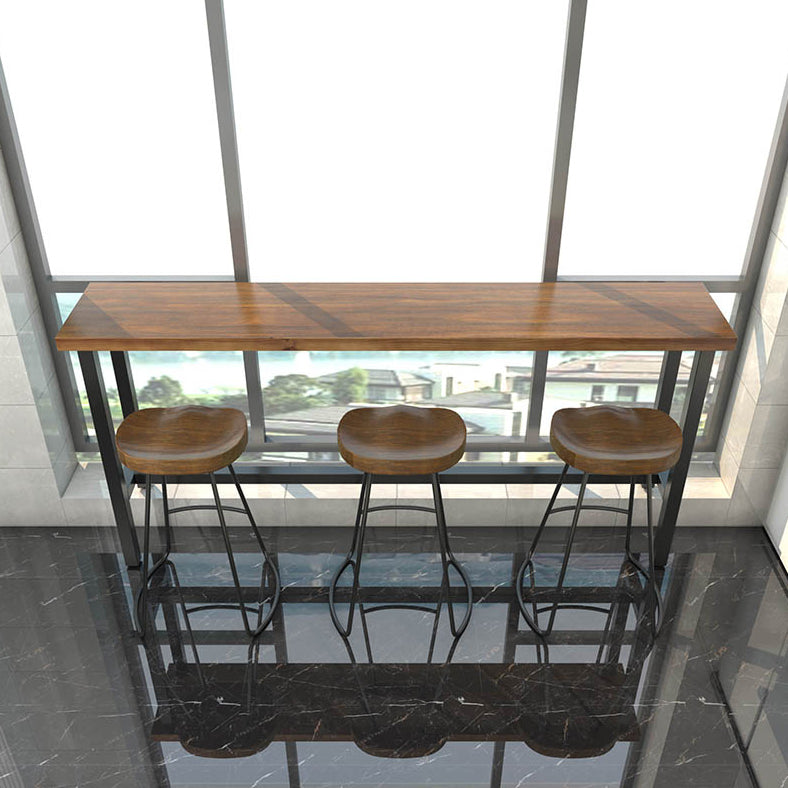 Brown Modern Style Bar Table Pine Wood and Iron Outdoor Bar Table 55.1"L x 15.7"W x 41.3"H Without Chairs Clearhalo 'Bar Furniture' 'Bar Tables' 'bar_tables' 'furn' 'furn_bar_tables' 'Furniture' 'furniture_bar_tables' 'Kitchen & Dining Furniture' 4598161