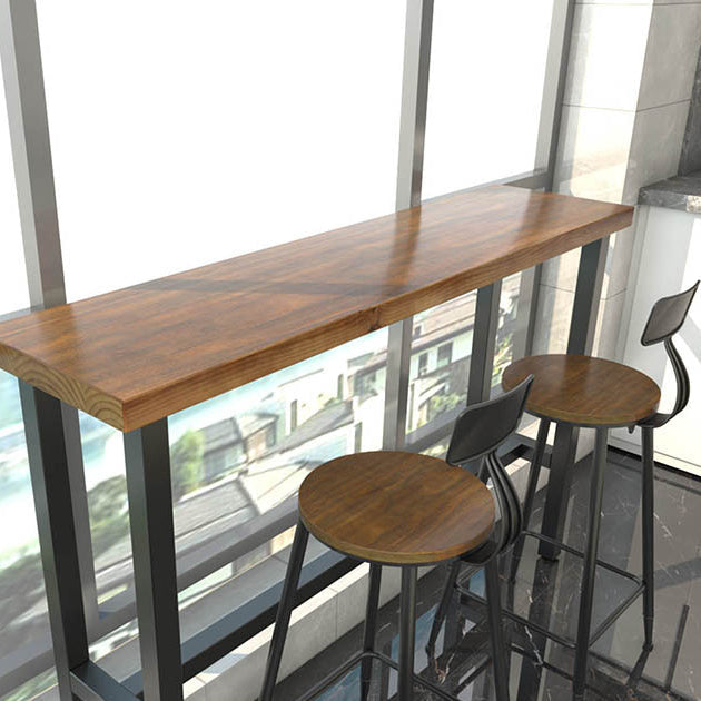 Brown Modern Style Bar Table Pine Wood and Iron Outdoor Bar Table 70.9"L x 15.7"W x 41.3"H Without Chairs Clearhalo 'Bar Furniture' 'Bar Tables' 'bar_tables' 'furn' 'furn_bar_tables' 'Furniture' 'furniture_bar_tables' 'Kitchen & Dining Furniture' 4598164
