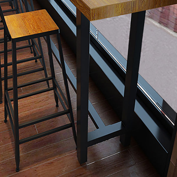 Brown Modern Style Bar Table Solid Wood and Metal with Footrest Coffee Shop Table Clearhalo 'Bar Furniture' 'Bar Tables' 'bar_tables' 'furn' 'furn_bar_tables' 'Furniture' 'furniture_bar_tables' 'Kitchen & Dining Furniture' 4598251