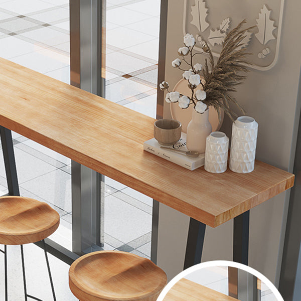 Brown Modern Style Bar Table Solid Wood and Black Iron Foot Coffee Shop Bar Table Clearhalo 'Bar Furniture' 'Bar Tables' 'bar_tables' 'furn' 'furn_bar_tables' 'Furniture' 'furniture_bar_tables' 'Kitchen & Dining Furniture' 'kitchen&dining_furn' 'kitchen' 4638761