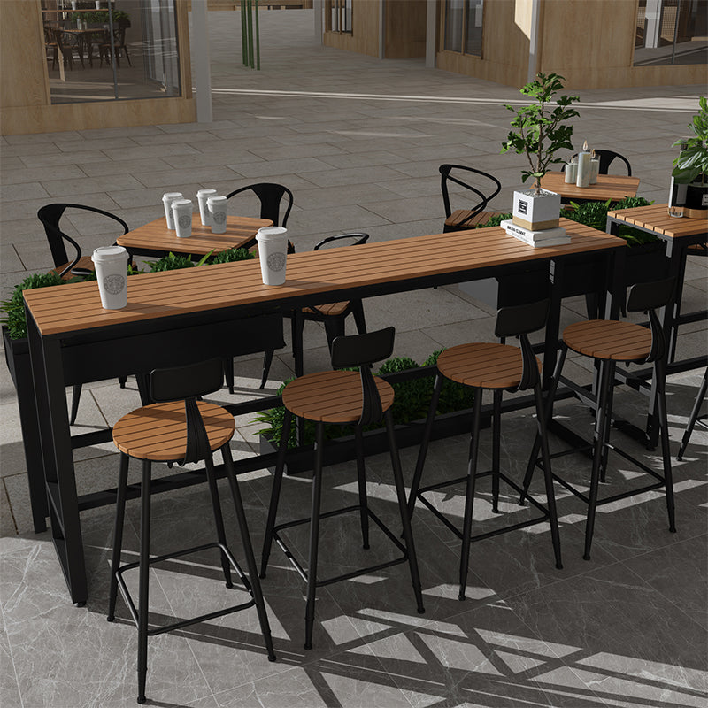 Modern Style Bar Table Solid Wood and Black Iron Base Coffee Shop Bar Table 110.2"L x 15.7"W x 41.3"H Without Chairs Clearhalo 'Bar Furniture' 'Bar Tables' 'bar_tables' 'furn' 'furn_bar_tables' 'Furniture' 'furniture_bar_tables' 'Kitchen & Dining Furniture' 'kitchen&dining_furn' 'kitchen' 4638825