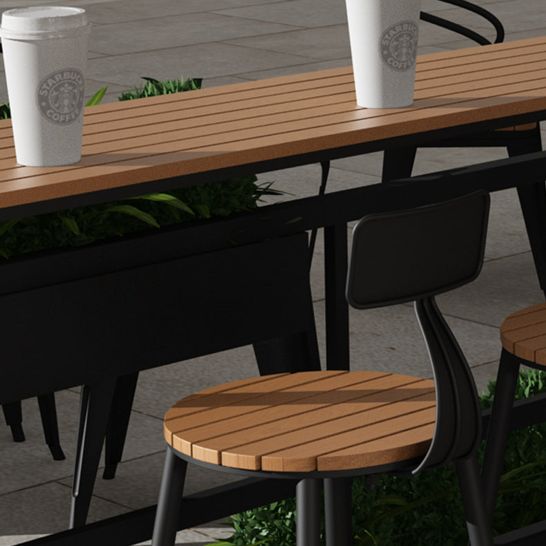 Modern Style Bar Table Solid Wood and Black Iron Base Coffee Shop Bar Table Clearhalo 'Bar Furniture' 'Bar Tables' 'bar_tables' 'furn' 'furn_bar_tables' 'Furniture' 'furniture_bar_tables' 'Kitchen & Dining Furniture' 'kitchen&dining_furn' 'kitchen' 4638829