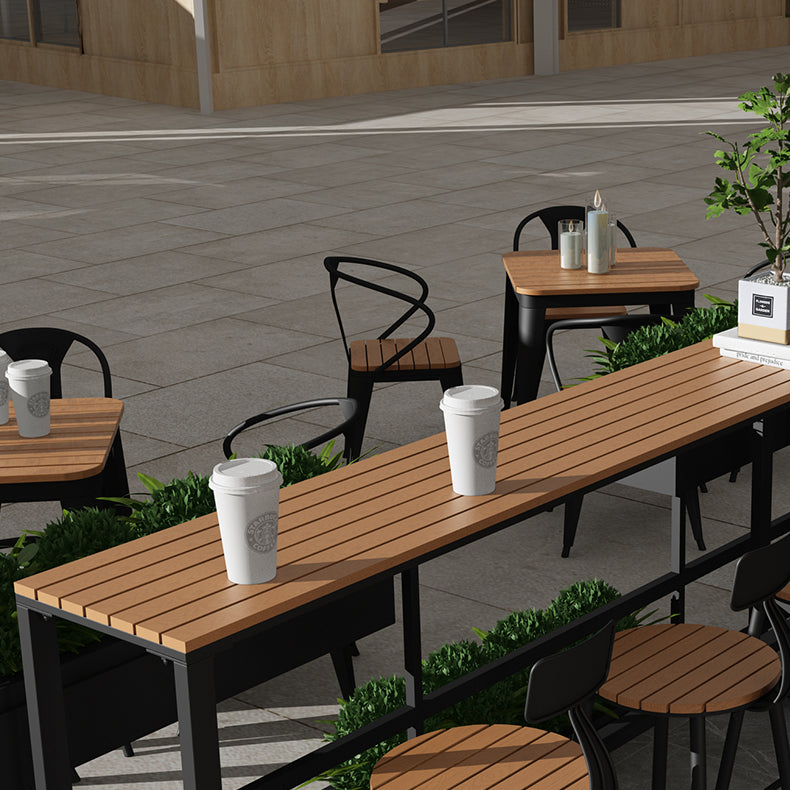 Modern Style Bar Table Solid Wood and Black Iron Base Coffee Shop Bar Table Clearhalo 'Bar Furniture' 'Bar Tables' 'bar_tables' 'furn' 'furn_bar_tables' 'Furniture' 'furniture_bar_tables' 'Kitchen & Dining Furniture' 'kitchen&dining_furn' 'kitchen' 4638831