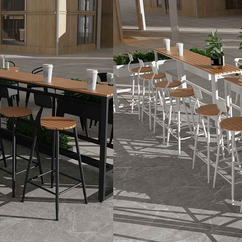 Modern Style Bar Table Solid Wood and Black Iron Base Coffee Shop Bar Table Clearhalo 'Bar Furniture' 'Bar Tables' 'bar_tables' 'furn' 'furn_bar_tables' 'Furniture' 'furniture_bar_tables' 'Kitchen & Dining Furniture' 'kitchen&dining_furn' 'kitchen' 4638832