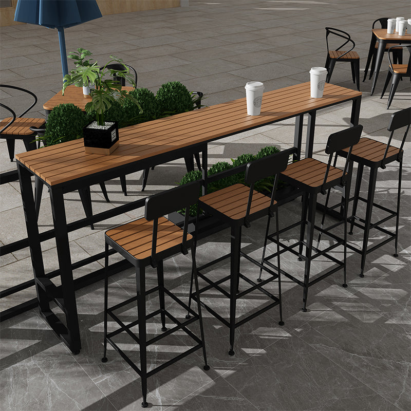 Modern Style Brown Bar Table Pine Wood and Iron Outdoor Bar Table 102.4"L x 15.7"W x 41.3"H Without Chairs Clearhalo 'Bar Furniture' 'Bar Tables' 'bar_tables' 'furn' 'furn_bar_tables' 'Furniture' 'furniture_bar_tables' 'Kitchen & Dining Furniture' 'kitchen&dining_furn' 'kitchen' 4638910