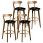 Modern Armless Backrest Counter Stool Wood Bar Stool with Cushion and Pedal Black Natural 4 Piece Set Clearhalo 'Bar Furniture' 'Bar Stools' 'bar_stools' 'furn' 'furn_bar_stools' 'furniture_bar_stools' 'Kitchen & Dining Furniture' 'kitchen&dining_furn' 'kitchen' 'kitchen_furn' Furniture' 4639587