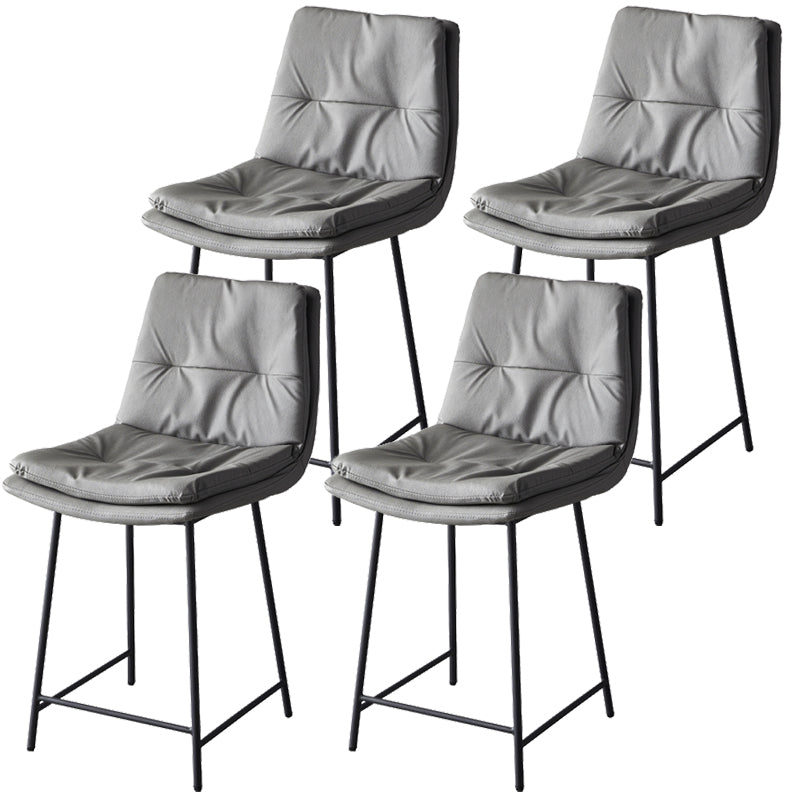 Contemporary Metal Leather Bar Stools Indoor Barstool with Iron Legs and Footrest Dark Gray 4 Piece Set Short Stool(22"H) Clearhalo 'Bar Furniture' 'Bar Stools' 'bar_stools' 'furn' 'furn_bar_stools' 'furniture_bar_stools' 'Kitchen & Dining Furniture' 'kitchen&dining_furn' 'kitchen' 'kitchen_furn' Furniture' 4654500