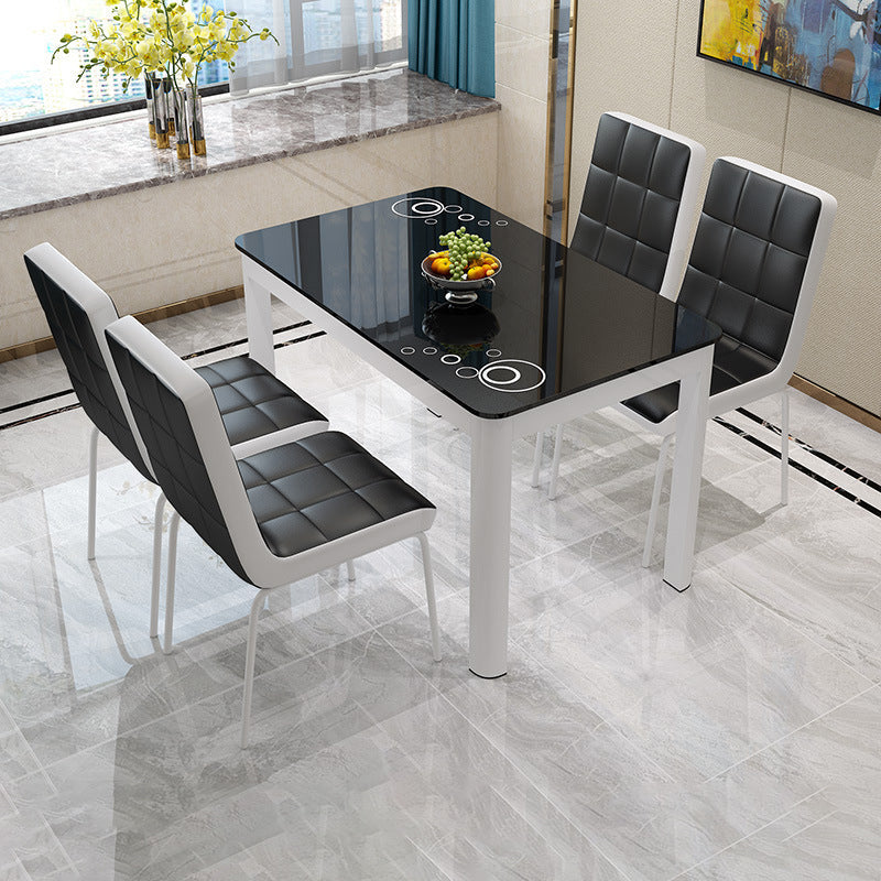 Glass Top Dining Table Modern Rectangle Dining Table with 4 Legs Black 47.2"L x 27.6"W x 29.5"H Clearhalo ' dining_table' 'Dining Tables & Seating' 'Dining Tables' 'Furniture' 'furniture_dining_table' 'Kitchen & Dining Furniture' 'kitchen&dining_furn' 'kitchen' 'kitchen_dining_table' 4656125