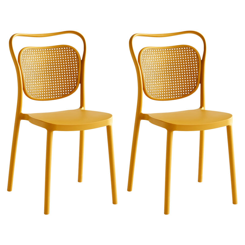 Scandinavian Design Plastic Dining Armless Chairs for Home Open Back Side Chair Yellow 2 Piece Set Clearhalo ' kitchen&dining_furn' 'Dining Chairs' 'Dining Tables & Seating' 'dining_chair' 'furn' 'furn_dining_chair' 'Furniture' 'furniture_dining_chair' 'Kitchen & Dining Furniture' 'kitchen' 4666226