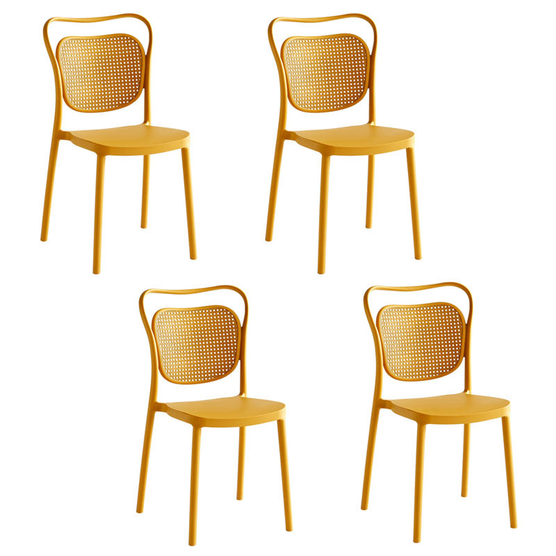 Scandinavian Design Plastic Dining Armless Chairs for Home Open Back Side Chair Yellow 4 Piece Set Clearhalo ' kitchen&dining_furn' 'Dining Chairs' 'Dining Tables & Seating' 'dining_chair' 'furn' 'furn_dining_chair' 'Furniture' 'furniture_dining_chair' 'Kitchen & Dining Furniture' 'kitchen' 4666229