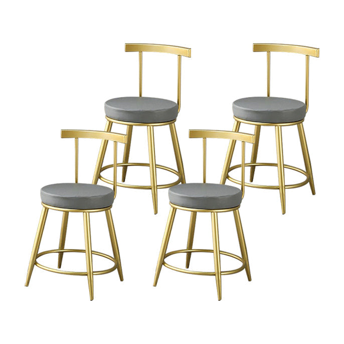 Glam Low Back Bar and Counter Stool Round Stool with 4 Gold Legs Set of 4 Short Stool(18"H) Clearhalo 'Bar Furniture' 'Bar Stools' 'bar_stools' 'furniture_bar_stools' 'Kitchen & Dining Furniture' 'kitchen&dining_furn' 'kitchen' 'kitchen_furn' Furniture' 4679383