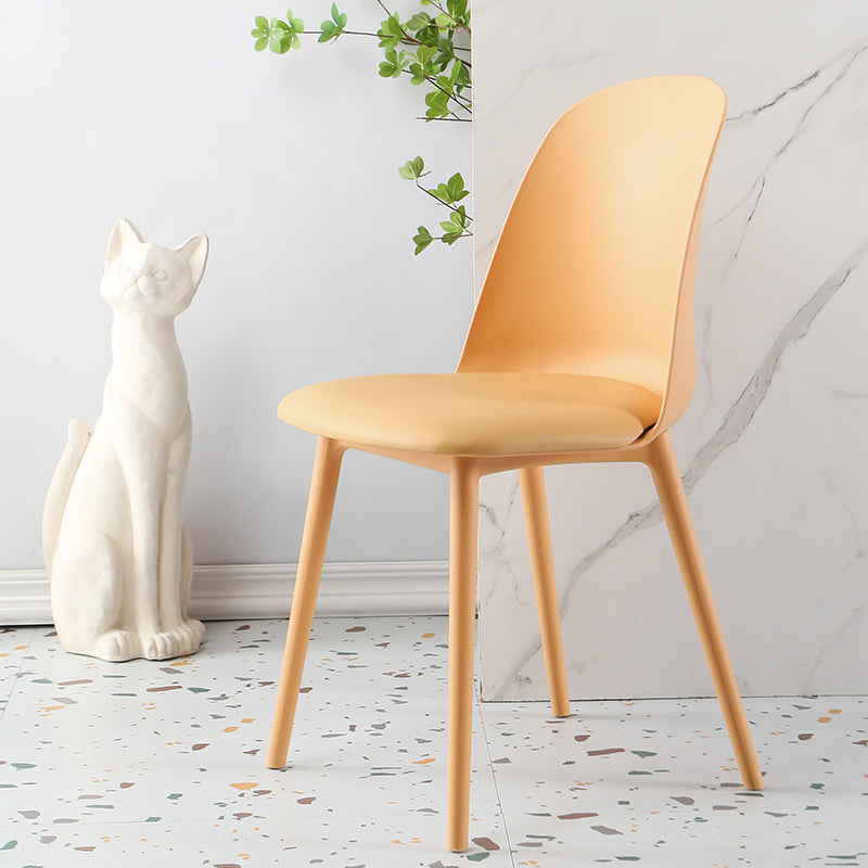 Scandinavian Armless Plastic Side Chair Solid Back Chair for Home Light Orange 1 Piece Clearhalo ' kitchen&dining_furn' 'Dining Chairs' 'Dining Tables & Seating' 'dining_chair' 'furn' 'furn_dining_chair' 'Furniture' 'furniture_dining_chair' 'Kitchen & Dining Furniture' 'kitchen' 4680540