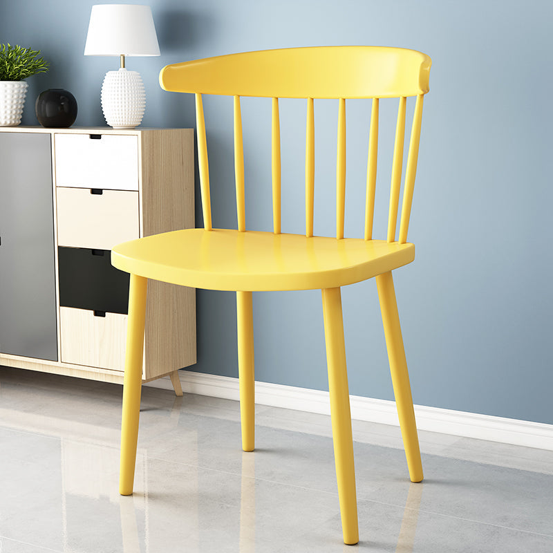 Scandinavian Colorful Windsor Back Side Chair Plastic Dining Armless Chair Yellow 1 Piece Clearhalo ' kitchen&dining_furn' 'Dining Chairs' 'Dining Tables & Seating' 'dining_chair' 'furn' 'furn_dining_chair' 'Furniture' 'furniture_dining_chair' 'Kitchen & Dining Furniture' 'kitchen' 4694111