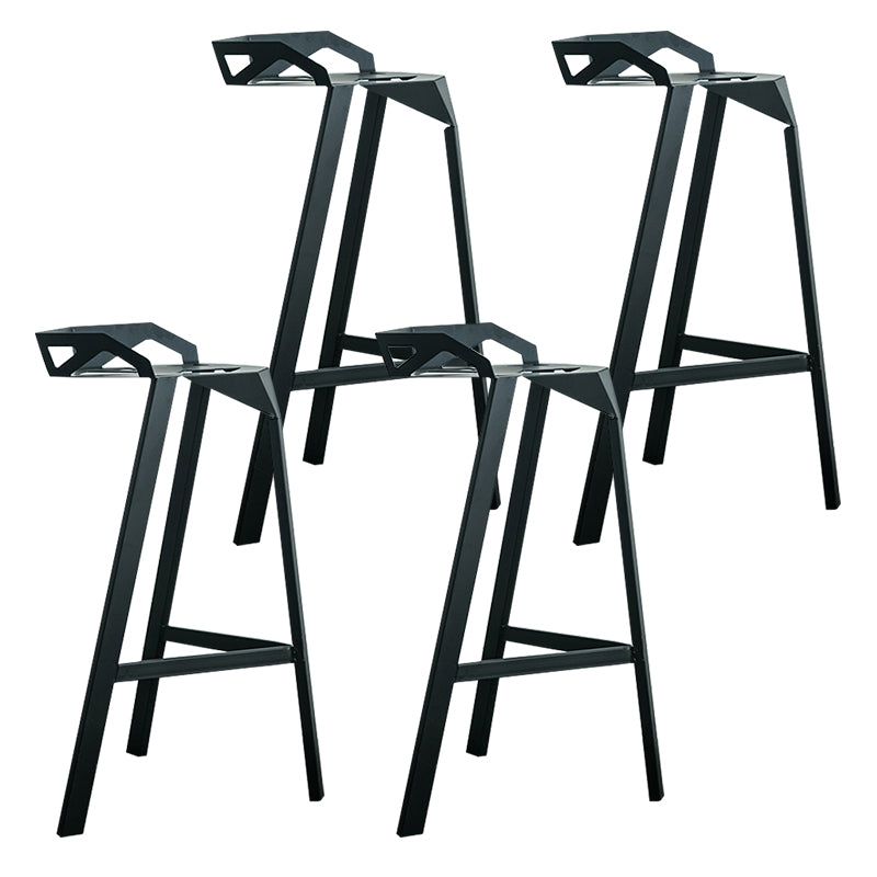 Industrial Stackable Iron Counter Stools Low Back 3 Legs Bar Stools with Footrest Black 4 Piece Set Clearhalo 'Bar Furniture' 'Bar Stools' 'bar_stools' 'furn' 'furn_bar_stools' 'Furniture' 'furniture_bar_stools' 'Kitchen & Dining Furniture' 4730375