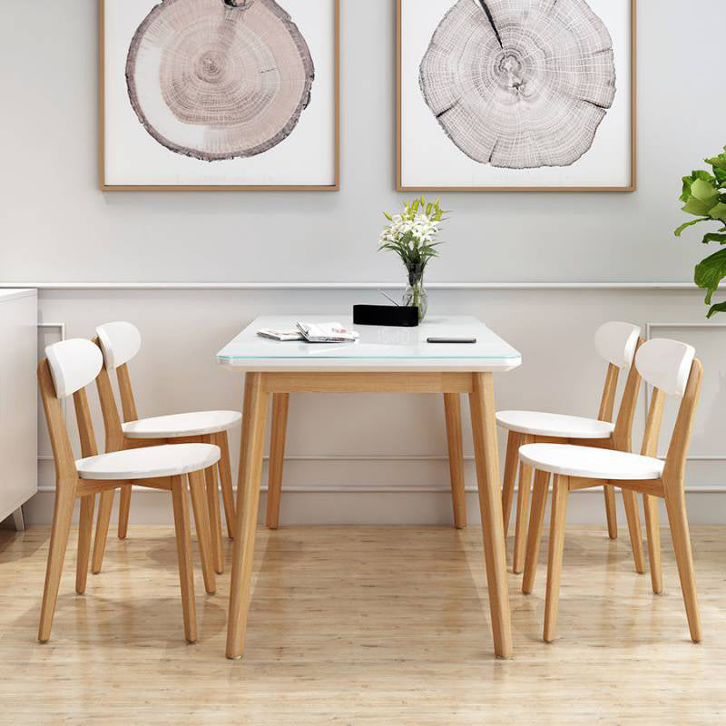 Glass Top Dining Table Modern Dining Table with 4 Solid Wood Legs 55.1"L x 31.5"W x 29.5"H Clearhalo 'Dining Tables & Seating' 'Dining Tables' 'dining_table' 'Furniture' 'furniture_dining_table' 'Kitchen & Dining Furniture' 'kitchen' 'kitchen_dining_table' 4745570