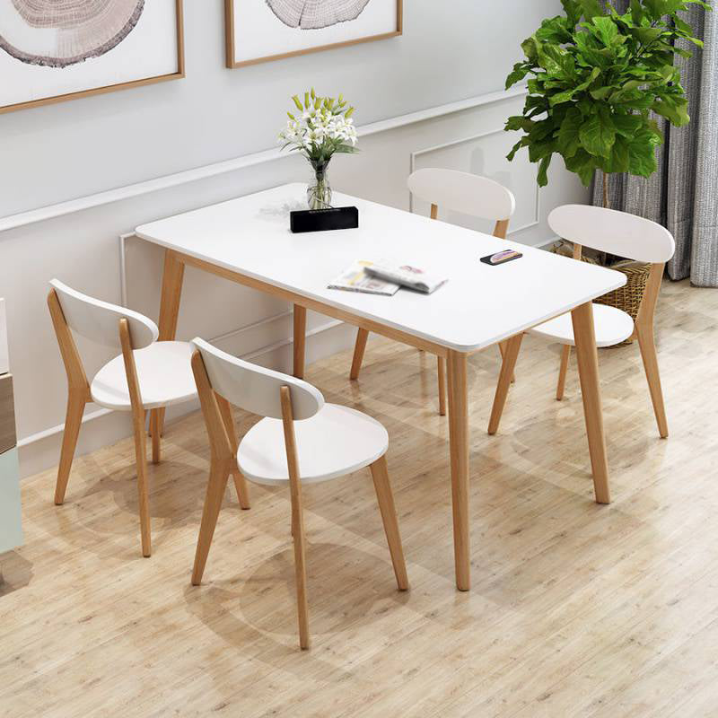 Glass Top Dining Table Modern Dining Table with 4 Solid Wood Legs 47.2"L x 27.6"W x 29.5"H Clearhalo 'Dining Tables & Seating' 'Dining Tables' 'dining_table' 'Furniture' 'furniture_dining_table' 'Kitchen & Dining Furniture' 'kitchen' 'kitchen_dining_table' 4745571