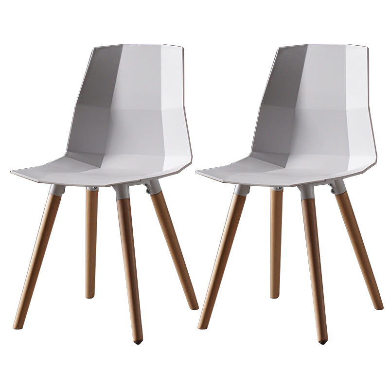 Nordic Design Plastic Dining Armless Chair Solid Back Chair with Wood Legs White 2 Piece Set Clearhalo 'Dining Chairs' 'Dining Tables & Seating' 'dining_chair' 'furn' 'furn_dining_chair' 'Furniture' 'furniture_dining_chair' 'Kitchen & Dining Furniture' 4746160