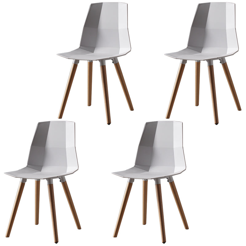Nordic Design Plastic Dining Armless Chair Solid Back Chair with Wood Legs White 4 Piece Set Clearhalo 'Dining Chairs' 'Dining Tables & Seating' 'dining_chair' 'furn' 'furn_dining_chair' 'Furniture' 'furniture_dining_chair' 'Kitchen & Dining Furniture' 4746161