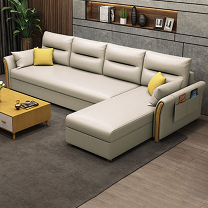 Modern Convertible Futon Sofa Bed 4-seater Settee Furniture with Bolster Pillows Faux Leather Beige Clearhalo 'furn' 'furn_sectionals' 'Furniture' 'furniture_sectionals' 'kitchen' 'kitchen_sectionals' 'Living Room Furniture' 'Sectionals' 4773657
