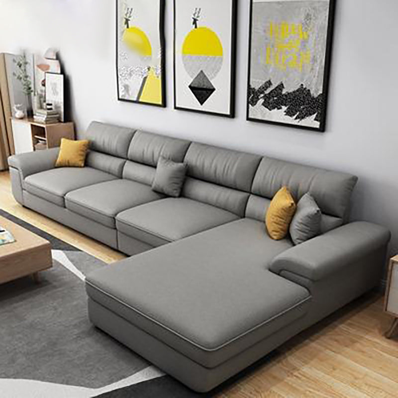 Modern Reversible Chaise Sofa with Pillows Flared Arm Sofa for Living Room Grey Faux Leather Clearhalo 'furn' 'furn_sectionals' 'Furniture' 'furniture_sectionals' 'kitchen' 'kitchen_sectionals' 'Living Room Furniture' 'Sectionals' 4779094