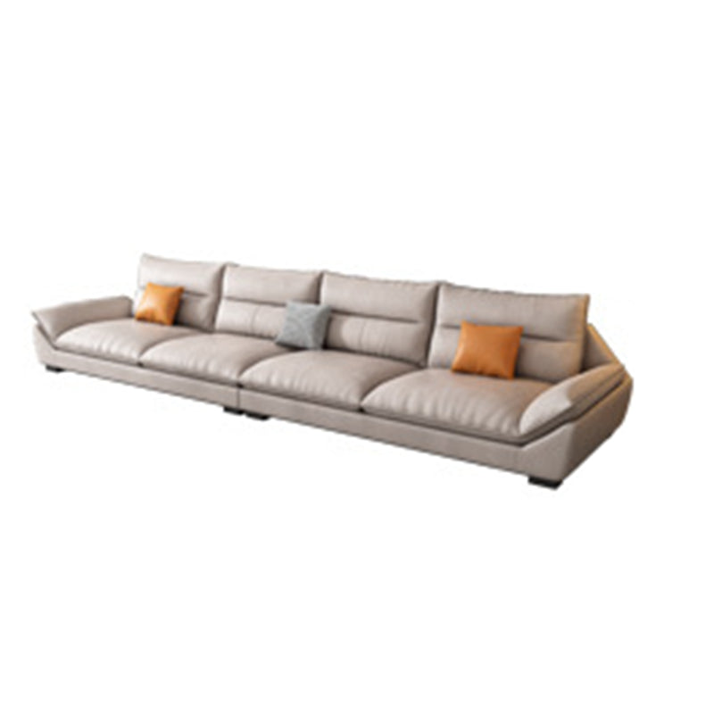 Flared Arm Beige Sectional Sofa with Chaise Pillowed Back Cushions Couch Sectional 130"L x 33.5"W x 35"H Clearhalo 'furn' 'furn_sectionals' 'Furniture' 'furniture_sectionals' 'kitchen' 'kitchen_sectionals' 'Living Room Furniture' 'Sectionals' 4785218