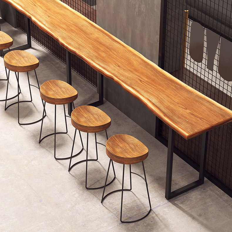 Solid Wood Bar Dining Table Industrial Bar Dining Table with Black Sled Base 110.2"L x 15.7"W x 41.3"H Without Chairs Clearhalo 'Bar Furniture' 'Bar Tables' 'bar_tables' 'furn' 'furn_bar_tables' 'Furniture' 'furniture_bar_tables' 'Kitchen & Dining Furniture' 4790125