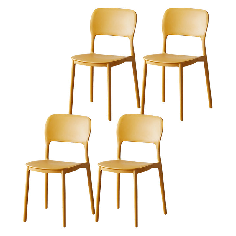 Scandinavian Plastic Stacking Dining Chairs Armless Open Back Chairs Yellow 4 Piece Set Clearhalo 'Dining Chairs' 'Dining Tables & Seating' 'dining_chair' 'furn' 'furn_dining_chair' 'Furniture' 'furniture_dining_chair' 'Kitchen & Dining Furniture' 4792378
