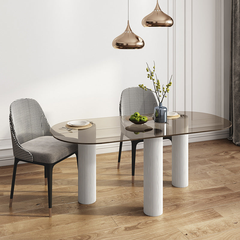 Glass Top Dining Table Modern Oval Indoor Dining Table with 3 White Legs Clear Without Chairs Clearhalo 'Dining Tables & Seating' 'Dining Tables' 'dining_table' 'furn' 'furn_dining_table' 'Furniture' 'furniture_dining_table' 'Kitchen & Dining Furniture' 'kitchen' 'kitchen_dining_table' 4818234