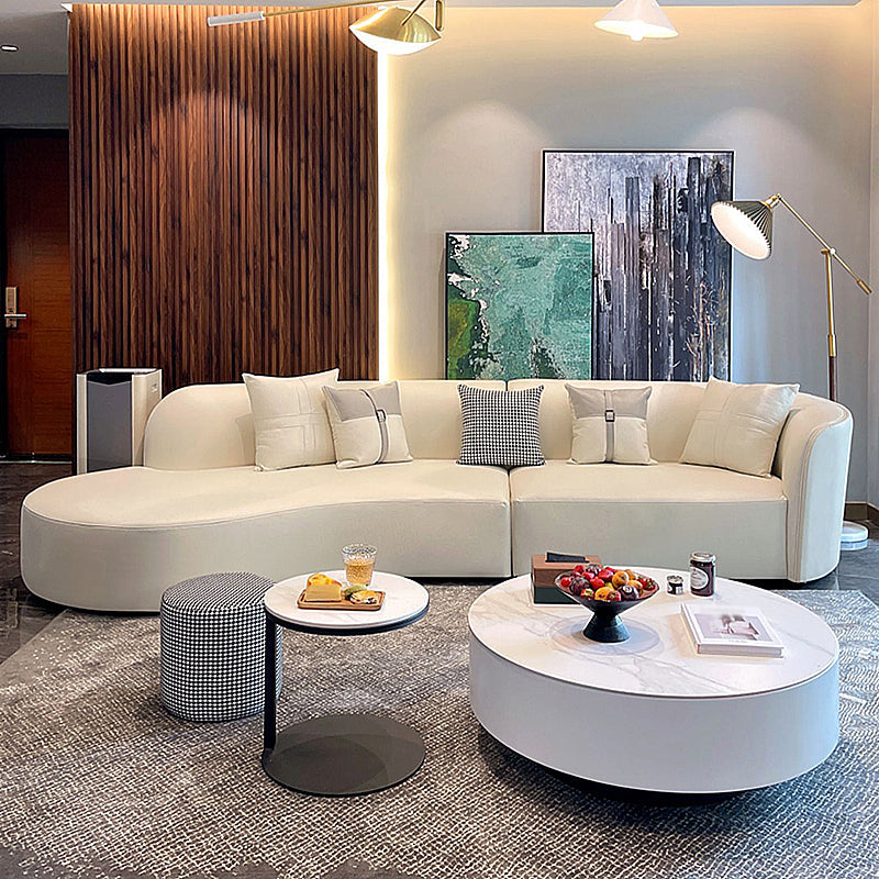 Stain-Resistant Modern Faux Leather Sofa/Sectional Pillowed Back Cushions 114"L x 57"W x 28"H Off-White Clearhalo 'furn' 'furn_sectionals' 'Furniture' 'furniture_sectionals' 'kitchen' 'kitchen_sectionals' 'Living Room Furniture' 'Sectionals' 4822271