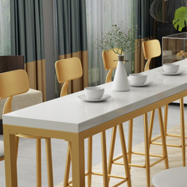 Glam Iron Bar Dining Table White Wood Rectangle Indoor Bistro Table with Footrest Clearhalo 'Bar Furniture' 'Bar Tables' 'bar_tables' 'furn' 'furn_bar_tables' 'Furniture' 'furniture_bar_tables' 'Kitchen & Dining Furniture' 4852626