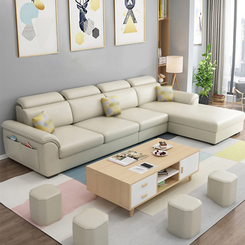 108.26" L x 62.99" W x 31.49" H Sofa Upholstered Arm Sectional with Pillowed Back Cushions Beige Faux Leather Sponge Clearhalo 'furn' 'furn_sectionals' 'Furniture' 'furniture_sectionals' 'kitchen' 'kitchen_sectionals' 'Living Room Furniture' 'Sectionals' 4855802
