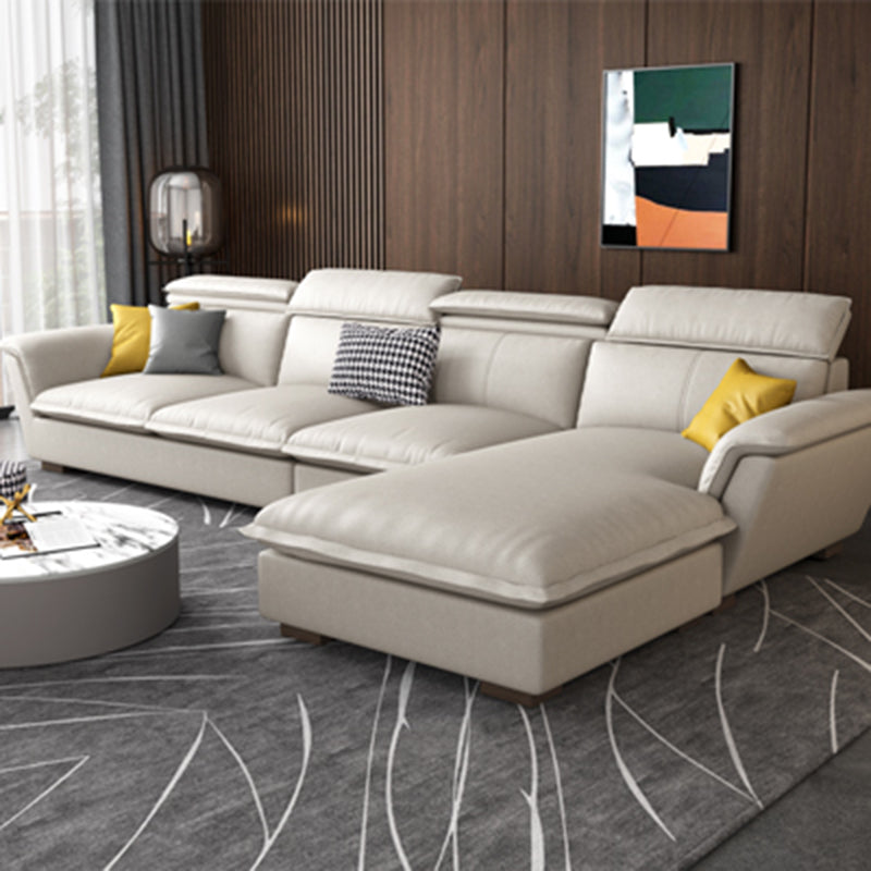Flared Arm L-Shape Sectional Right Hand Facing Sofa and Chaise for Four People Faux Leather Beige Latex Clearhalo 'furn' 'furn_sectionals' 'Furniture' 'furniture_sectionals' 'kitchen' 'kitchen_sectionals' 'Living Room Furniture' 'Sectionals' 4856375