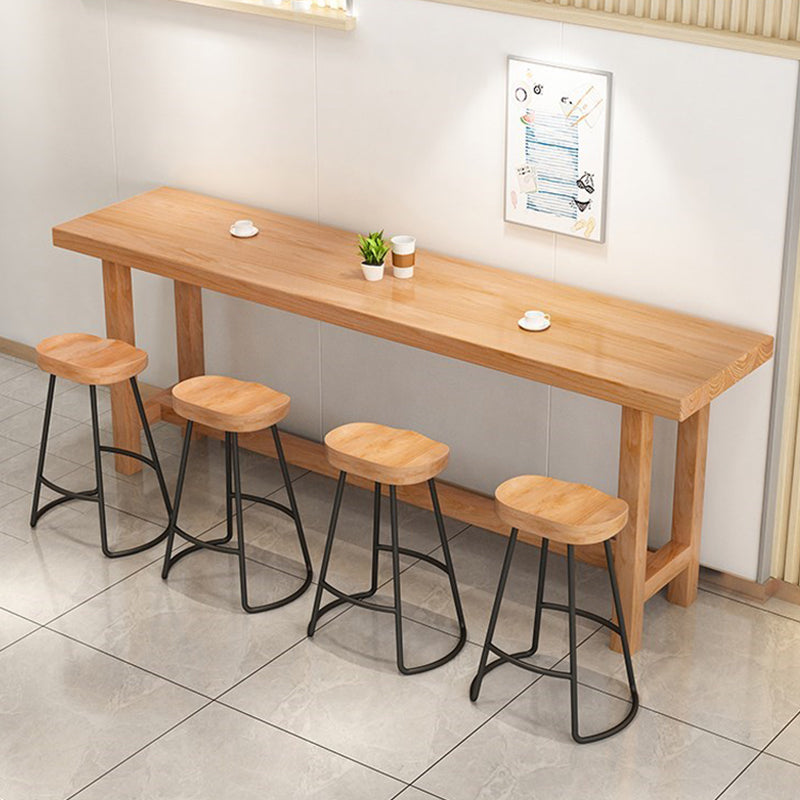 Modern Beige Rectangle Bar Dining Table Pine Wood Indoor Bistro Table with Footrest Clearhalo 'Bar Furniture' 'Bar Tables' 'bar_tables' 'furn' 'furn_bar_tables' 'Furniture' 'furniture_bar_tables' 'Kitchen & Dining Furniture' 4861473