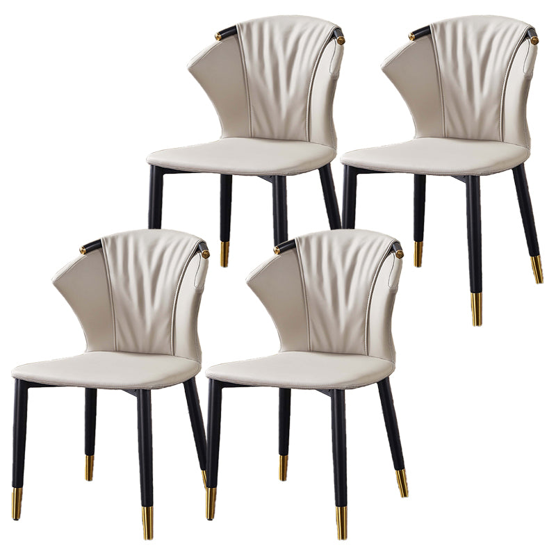 Glam Style Armless Chair Faux Leather Wingback Parsons Chair for Kitchen Grey 4 Piece Set Clearhalo 'Dining Chairs' 'Dining Tables & Seating' 'dining_chair' 'furn' 'furn_dining_chair' 'Furniture' 'furniture_dining_chair' 'Kitchen & Dining Furniture' 4863895