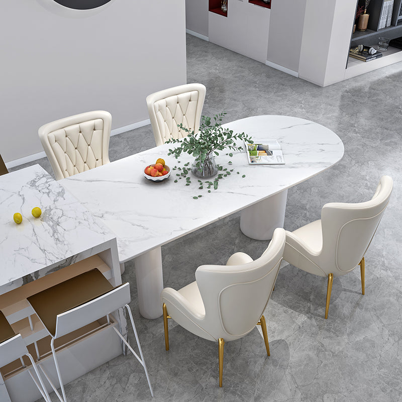 Oval White Base Dining Table Modern Stone Tripod Iron base Table White 55.1"L x 31.5"W x 29.5"H Without Chairs Clearhalo 'Dining Tables & Seating' 'Dining Tables' 'dining_table' 'furn' 'furn_dining_table' 'Furniture' 'furniture_dining_table' 'Kitchen & Dining Furniture' 'kitchen' 'kitchen_dining_table' 4876728
