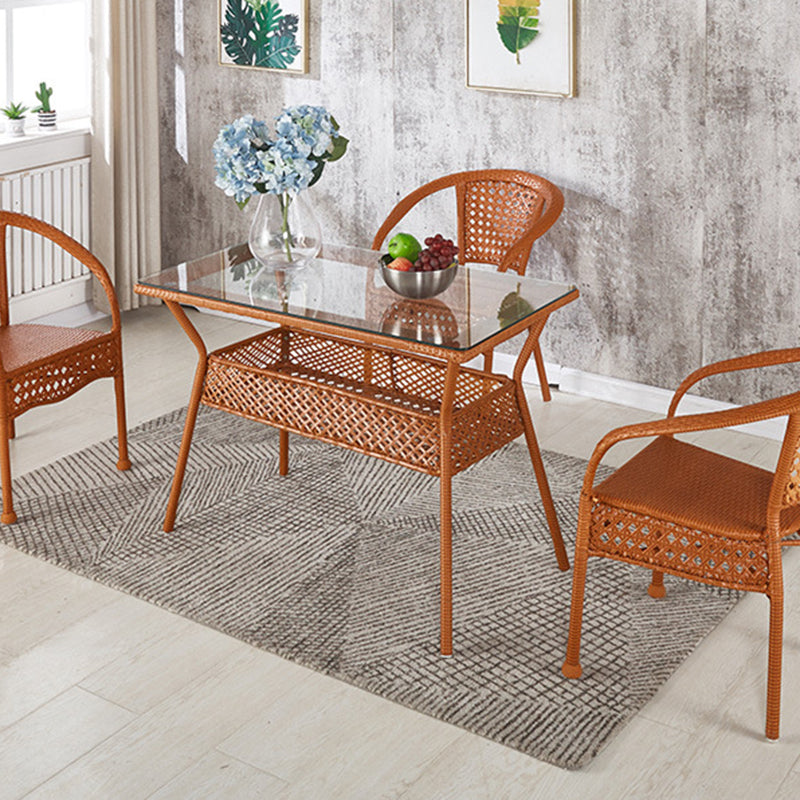 Rattan Contemporary Rectangular Dining Table Glass Top Table for Dining Room Orange 47.2"L x 27.6"W x 29.5"H Without Chairs Clearhalo 'Dining Tables & Seating' 'Dining Tables' 'dining_table' 'furn' 'furn_dining_table' 'Furniture' 'furniture_dining_table' 'Kitchen & Dining Furniture' 'kitchen' 'kitchen_dining_table' 4900673