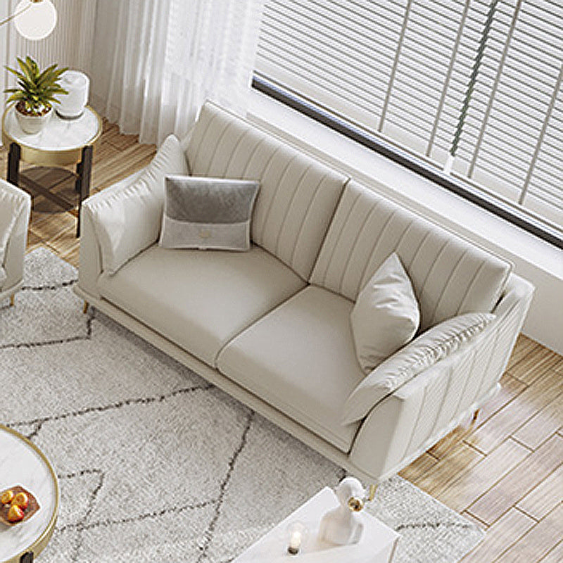 Scandinavian Upholstered Faux Leather Sofa Beige Sewn Pillow Back Couch 75"L x 31"W x 35"H Memory Foam Clearhalo 'furn' 'furn_sofas' 'Furniture' 'furniture_sofas' 'Living Room Furniture' 'Sofa' 'sofas' 4919060