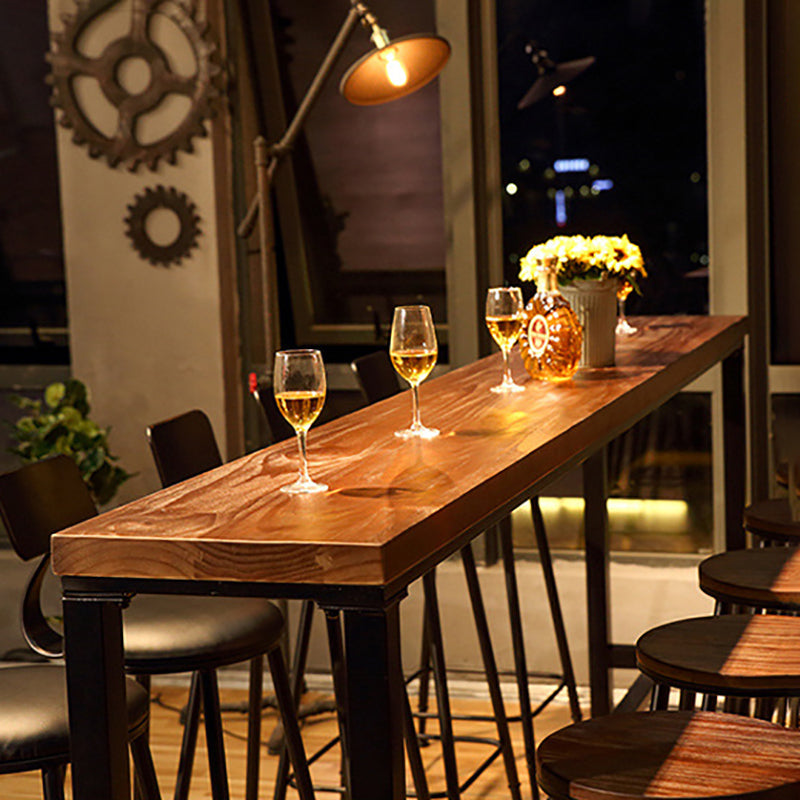 Wood Bar Dining Table Industrial Bar Dining Table with Black Trestle Base Clearhalo 'Bar Furniture' 'Bar Tables' 'bar_tables' 'furn' 'furn_bar_tables' 'Furniture' 'furniture_bar_tables' 'Kitchen & Dining Furniture' 4939160