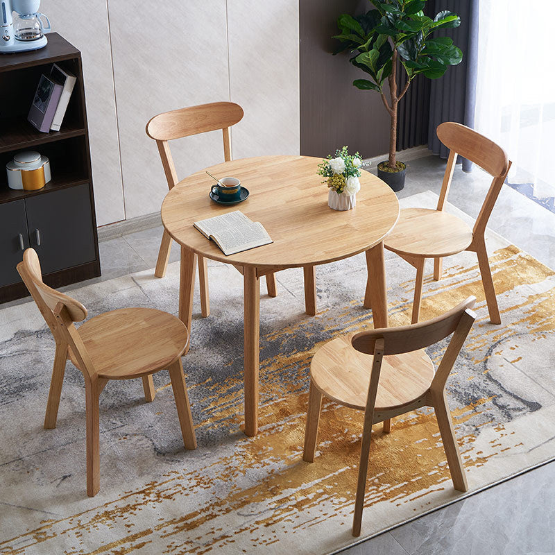 Nordic Solid Wood Top Dining Table Round Modern Dining Table Clearhalo 'Dining Tables & Seating' 'Dining Tables' 'dining_table' 'furn' 'furn_dining_table' 'Furniture' 'Kitchen & Dining Furniture' 4954335_abf4fce1-2796-4536-ad88-4cd0428bfaa8
