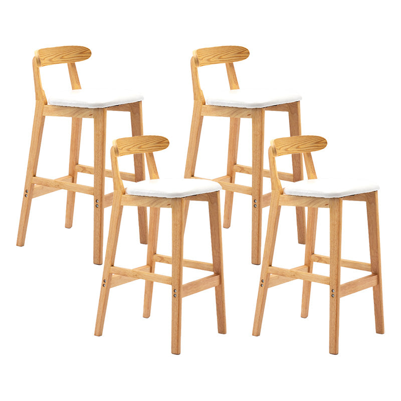 Scandinavian Milk Tea Shop Rubberwood Stool Matte Finish Upholstered Bar Stools White 4 Piece Set Clearhalo 'Bar Furniture' 'Bar Stools' 'bar_stools' 'furn' 'furn_bar_stools' 'Furniture' 'furniture_bar_stools' 'Kitchen & Dining Furniture' 4961429