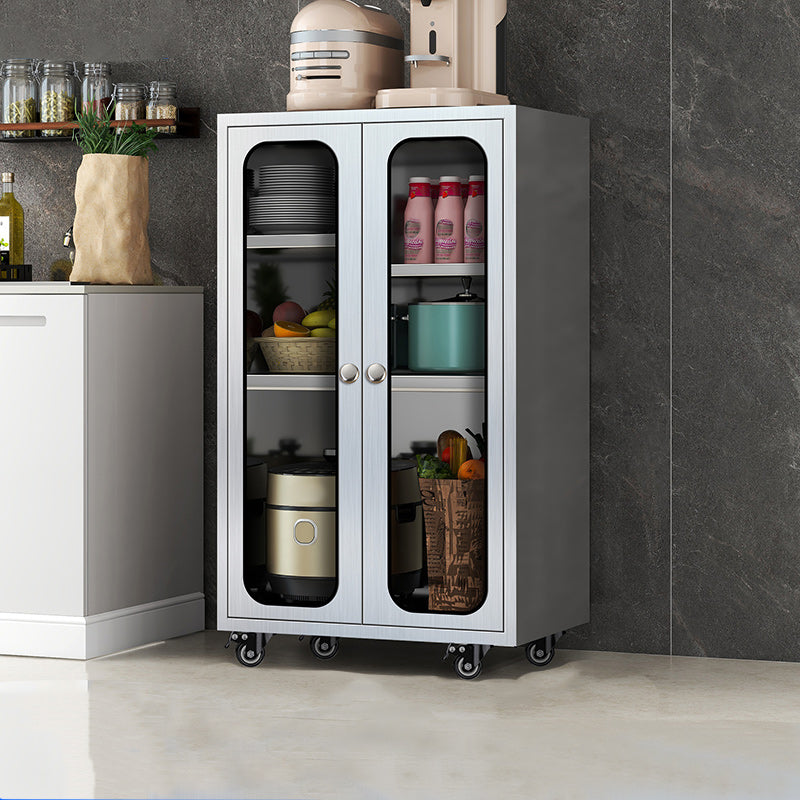 Modern Stainless Steel Dining Server Silver Adjustable Shelving Cabinets with Door 24"L x 16"W x 38"H Glass Clearhalo 'buffet_sideboard' 'Buffets & Sideboards' 'furn' 'furn_buffet_sideboard' 'Furniture' 'furniture_buffet_sideboard' 'Kitchen & Dining Furniture' 4965489