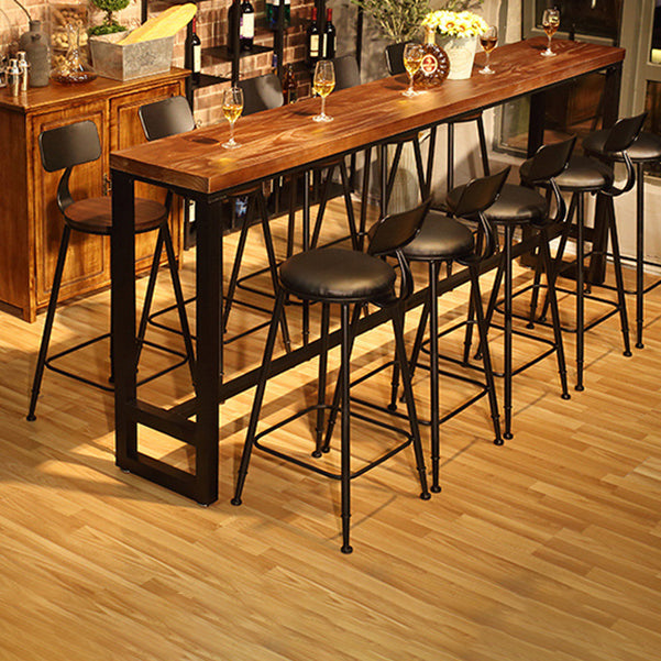 Natural Wood Top Bar Table Rectangle Industrial Footrest Indoor Bar Dining Table 63"L x 15.7"W x 41.3"H Without Chairs Clearhalo 'Bar Furniture' 'Bar Tables' 'bar_tables' 'furn' 'furn_bar_tables' 'Furniture' 'furniture_bar_tables' 'Kitchen & Dining Furniture' 4983796