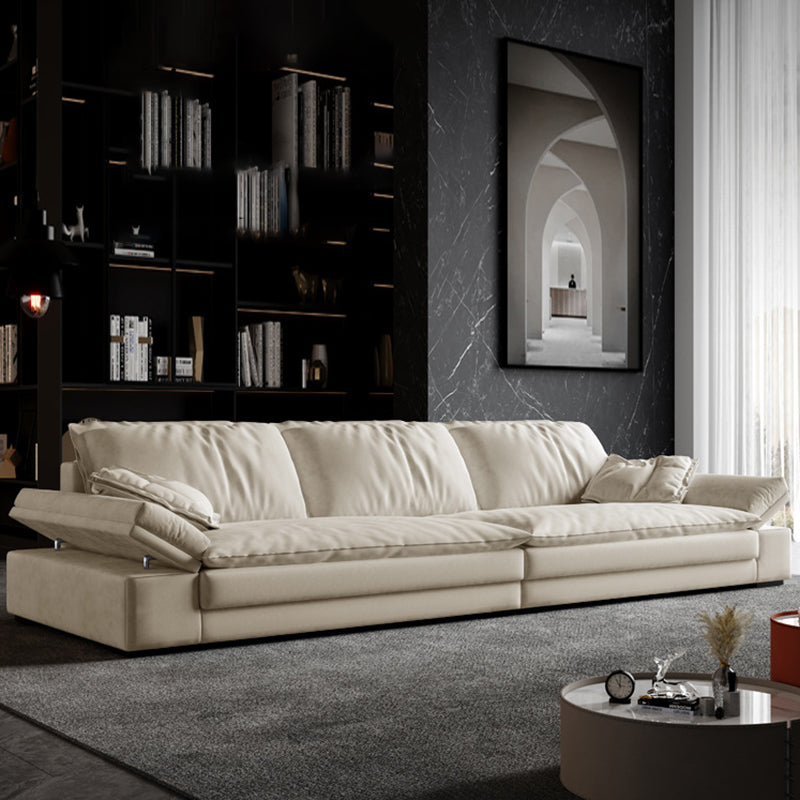 Faux Leather Loose Back Sofa White 31.5" H Pillow Top Arm Sofa& Chaise 98"L x 31"W x 31"H Clearhalo 'furn' 'furn_sectionals' 'Furniture' 'furniture_sectionals' 'Living Room Furniture' 'Sectionals' 5022606