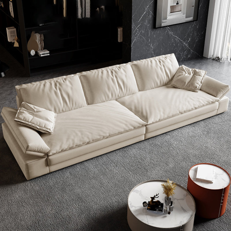Faux Leather Loose Back Sofa White 31.5" H Pillow Top Arm Sofa& Chaise 87"L x 43"W x 31"H Latex Clearhalo 'furn' 'furn_sectionals' 'Furniture' 'furniture_sectionals' 'Living Room Furniture' 'Sectionals' 5022608