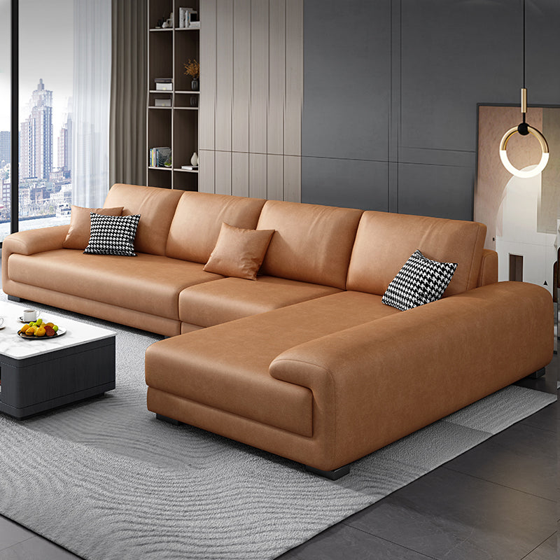 133.9"W √ó 70.87"D √ó35.43"H Faux Leather Pillow Top Arm Sectional with Stain-Resistant Orange Clearhalo 'furn' 'furn_sectionals' 'Furniture' 'furniture_sectionals' 'Living Room Furniture' 'Sectionals' 5022766