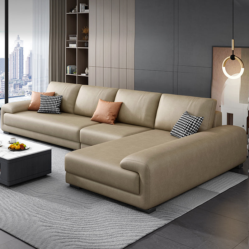 133.9"W √ó 70.87"D √ó35.43"H Faux Leather Pillow Top Arm Sectional with Stain-Resistant Khaki Clearhalo 'furn' 'furn_sectionals' 'Furniture' 'furniture_sectionals' 'Living Room Furniture' 'Sectionals' 5022770
