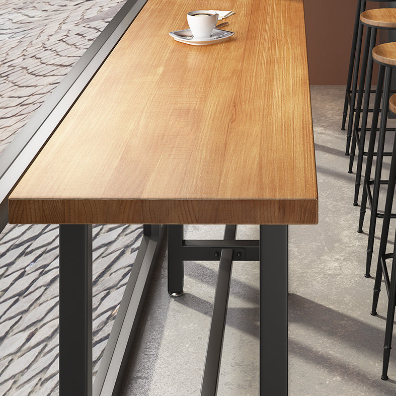 Wood Natural Bistro Accent Dining Table Modern Rectangle Footrest Pub Table Clearhalo 'Bar Furniture' 'Bar Tables' 'bar_tables' 'furn' 'furn_bar_tables' 'Furniture' 'furniture_bar_tables' 'Kitchen & Dining Furniture' 5051695