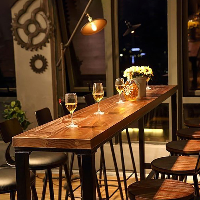 Industrial Brown and Black Bistro Bar Desk Solid Wood Trestle Bistro Bar Table Clearhalo 'Bar Furniture' 'Bar Tables' 'bar_tables' 'furn' 'furn_bar_tables' 'Furniture' 'furniture_bar_tables' 'Kitchen & Dining Furniture' 5061169